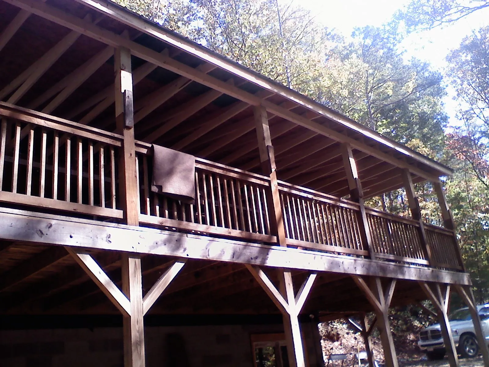 Timber framing under a new elevated porch and deck — Roof Leak Repair in Anniston by Roofing Brothers